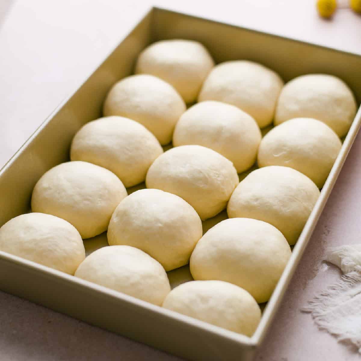 proofed dough balls ready to be baked