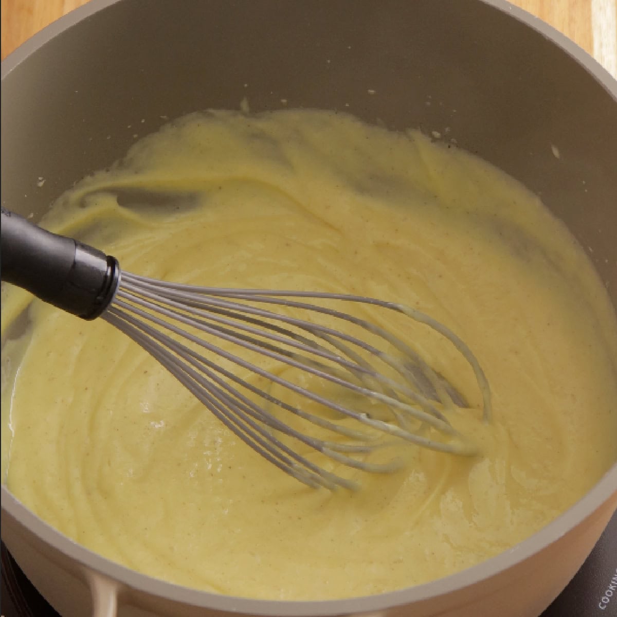 whisking thickened pastry cream