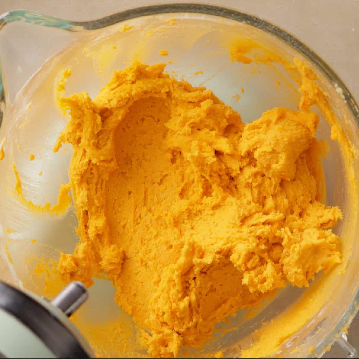 orange sugar cookies with clove cookie dough.